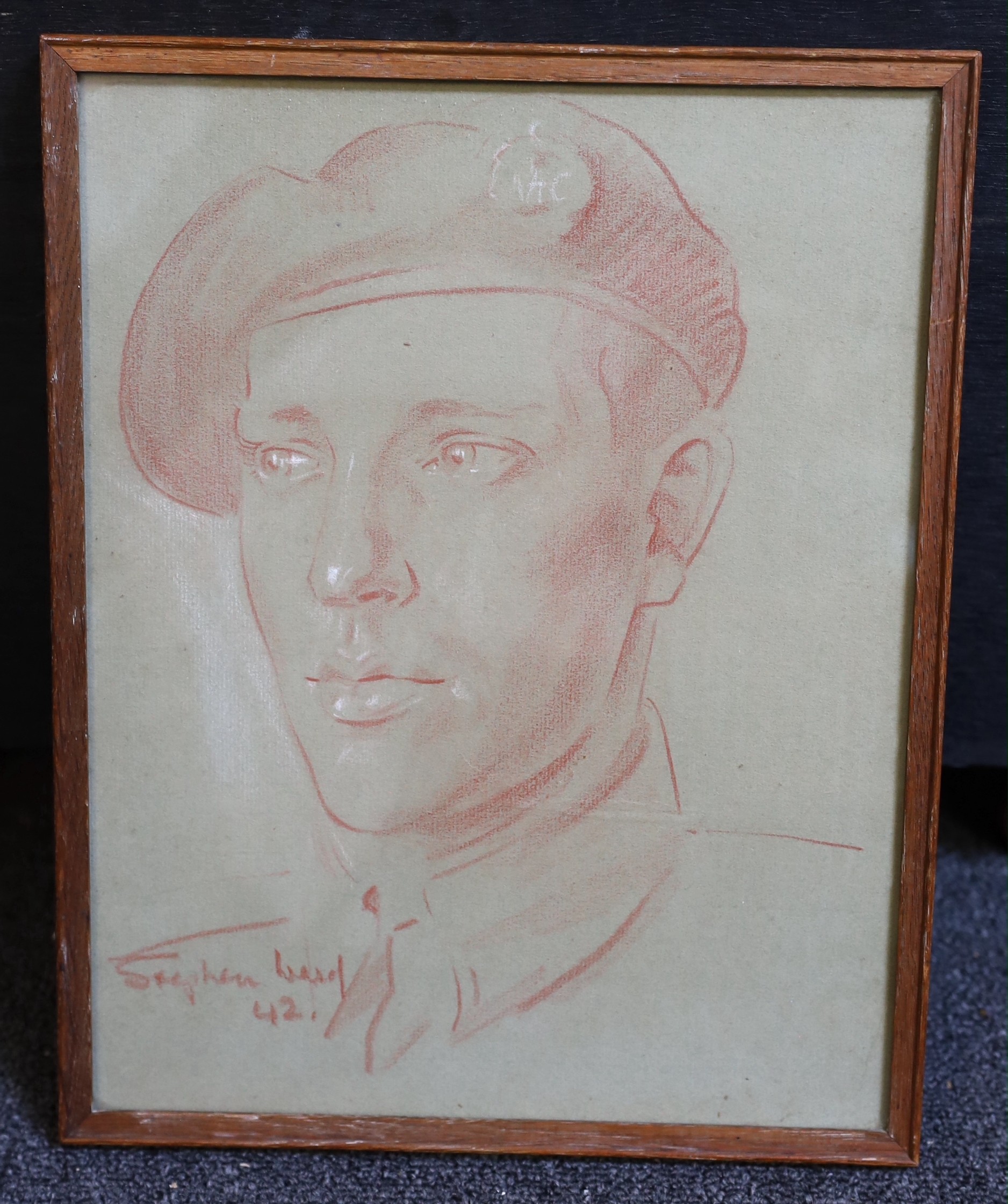 Stephen Ward (1912-1963), Portrait of a soldier in the Royal Armoured Corps, white and sanguine chalk on grey paper, 29.5 x 23cm